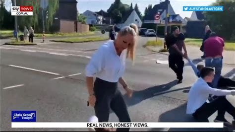 brutal blonde|Woman dubbed 'brutal blonde' seen dragging climate change .